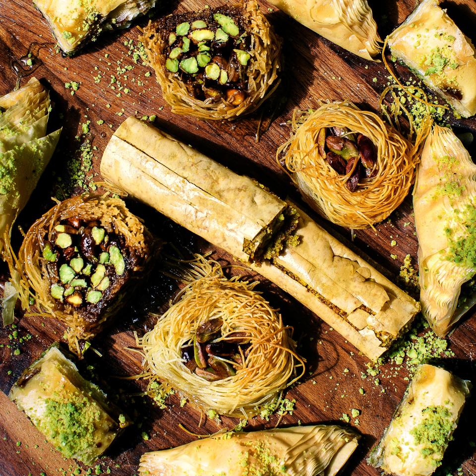 A platter of pastries: baklava of all sizes and shapes and bird’s nests