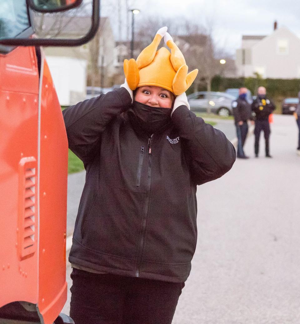 Myvette Bonilla Sousa of Blount Foods has a little fun with her turkey hat at a turkey giveaway in 2020.