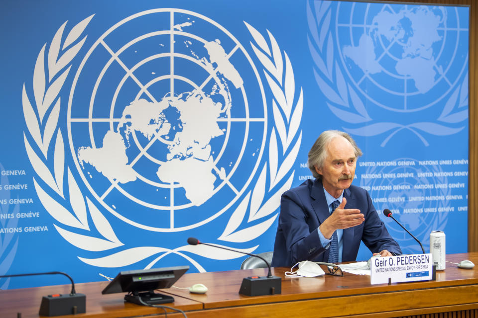 Geir O. Pedersen, UN Special Envoy for Syria, speaks to the media about the sixth session of the Constitutional Committee Small Body, during a press conference at the European headquarters of the United Nations in Geneva, Switzerland, Sunday, Oct. 17, 2021. (Martial Trezzini/Keystone via AP)