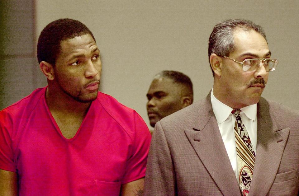 Ray Lewis and his attorney Max Richardson Jr., listen to the proceedings in Atlanta Municipal Court during Lewis’ preliminary hearing on Feb. 1, 2000, in Atlanta. (AP)