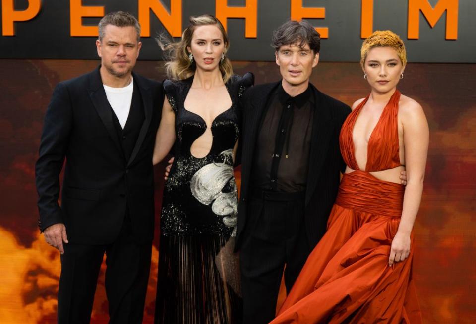 damon, emily blunt, cillian murphy and florence pugh attend the oppenheimer uk premiere at odeon luxe leicester square, all lined up in each other's arms