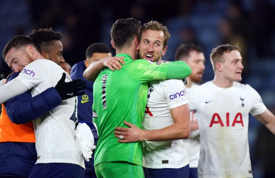 Tottenham captain Hugo Lloris hugs Harry Kane after beating Leicester (PA)