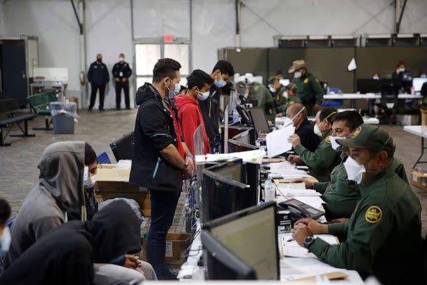 PHOTO: Migrants are processed at the intake area in the Department of Homeland Security holding facility run by the Customs and Border Patrol (CBP) on March 30, 2021 in Donna, Texas. (Dario Lopez-Mills - Pool/Getty Images, FILE)