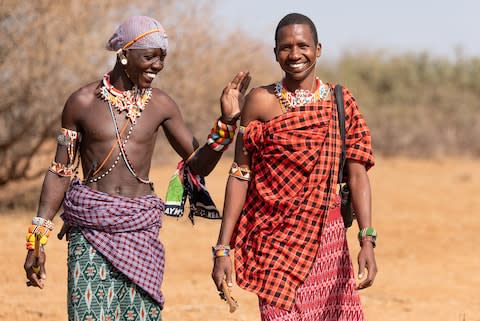 Jeneria Lekilelei (right) has made it his mission to protect Kenya's lions - Credit: Sarah Marshall