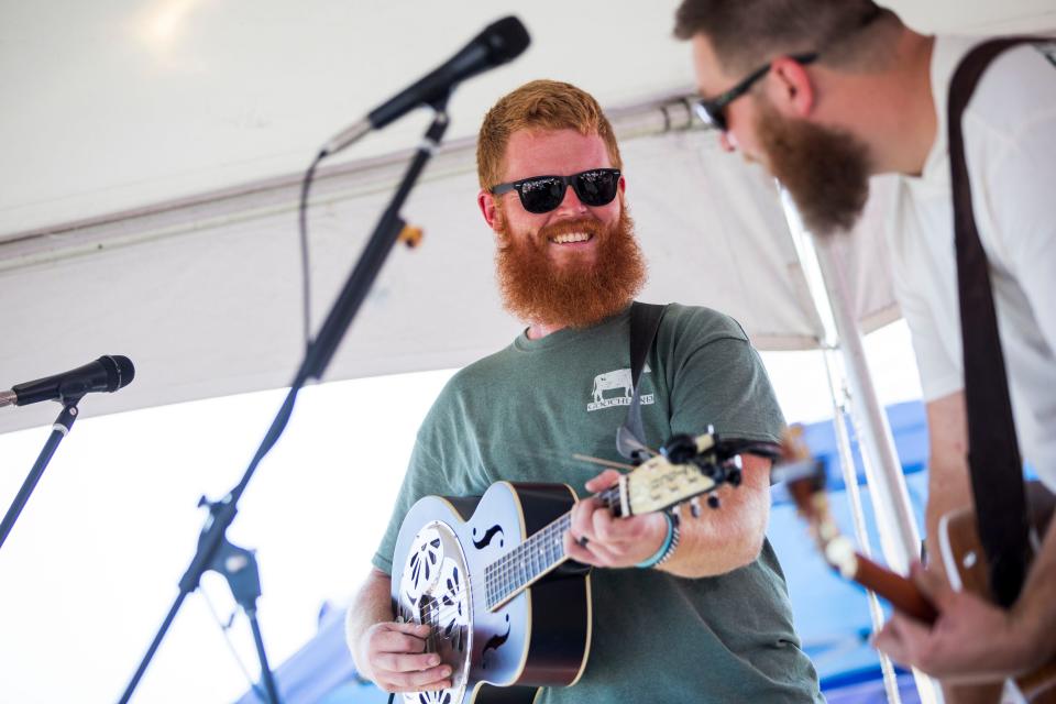 Oliver Anthony performs at Eagle Creek Golf Club and Grill in Moyock, N.C., on Saturday, Aug. 19, 2023. Anthony, a Farmville, Va., native, is best known for his song "Rich Men North of Richmond," which went viral, making him an overnight country sensation. (Kendall Warner/The Virginian-Pilot via AP) ORG XMIT: VANOV601