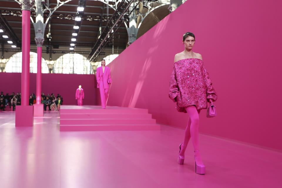 A model wears a creation as part of the Valentino Ready To Wear Fall/Winter 2022-2023 fashion collection, unveiled during the Fashion Week in Paris, Sunday, March 6, 2022. (Photo by Vianney Le Caer/Invision/AP)