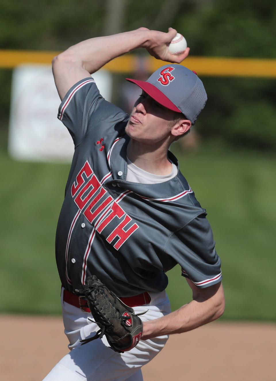 Canton South's Brady Noll delivers at pitch against Canton Central Catholic at Canton South Tuesday, May10, 2022.