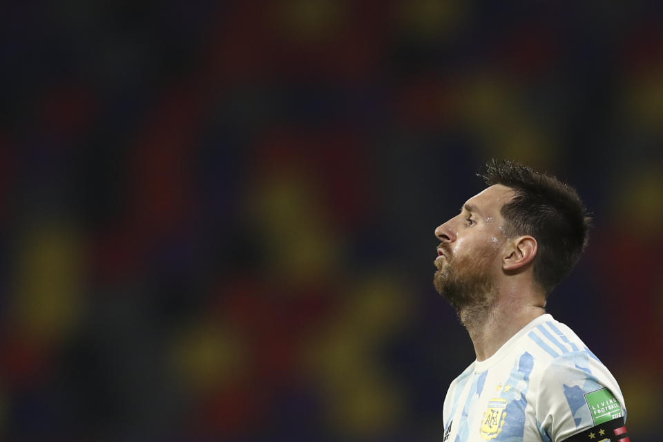 Argentina's Lionel Messi gestures during a qualifying soccer match against Chile for the FIFA World Cup Qatar 2022 in Santiago del Estero, Argentina, Thursday, June 3, 2021. (Agustin Marcarian, Pool via AP)