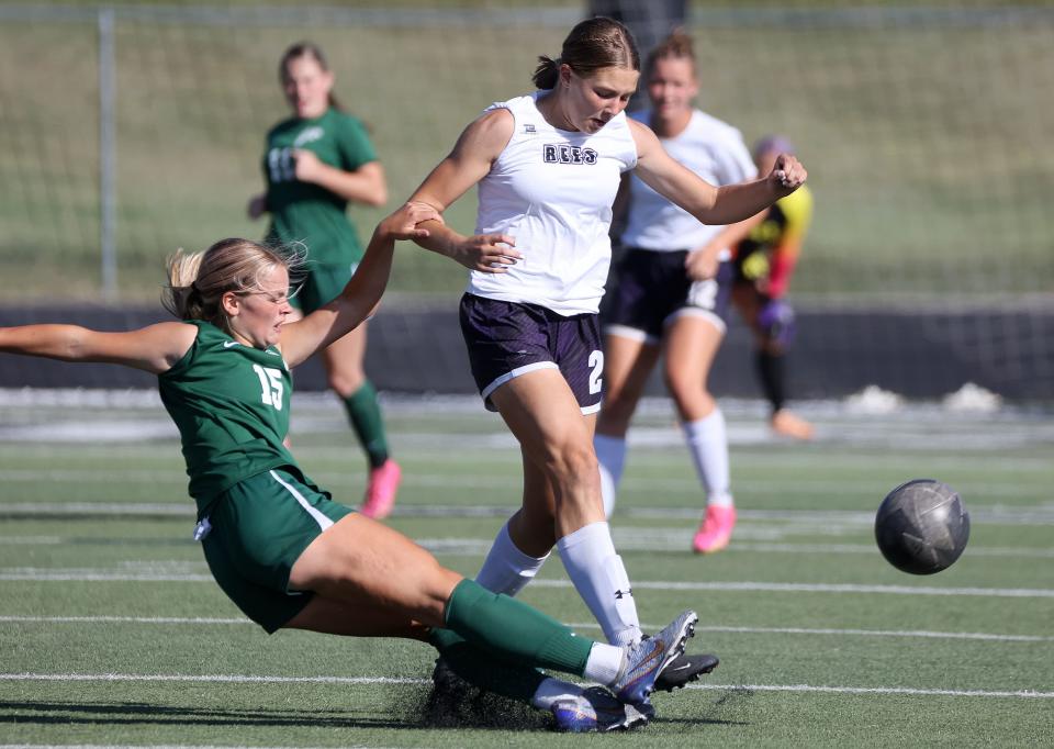 Clearfield’s Raegan Cornell falls as she and Box Elder’s Halli Wright fight for the ball during a girls varsity soccer game at Clearfield High School in Clearfield on Thursday, Sept. 14, 2023. Clearfield won 2-1. | Kristin Murphy, Deseret News