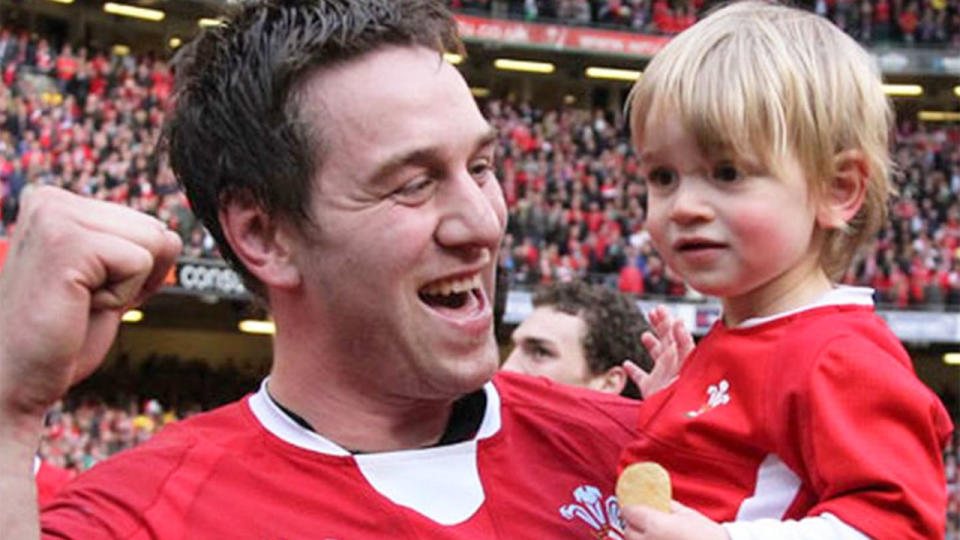 Seen here, Ryan Jones savouring a famous win for Wales with his family. 