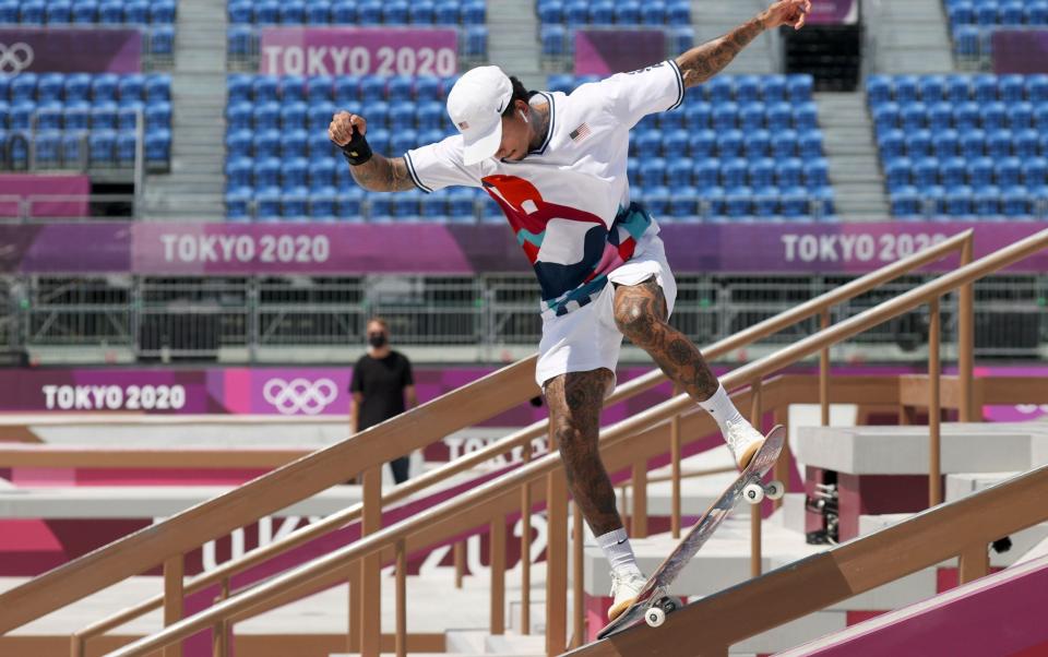 The USA's Nyjah Huston skates a handrail at the Ariake Urban Sports Park - SHUTTERSTOCK