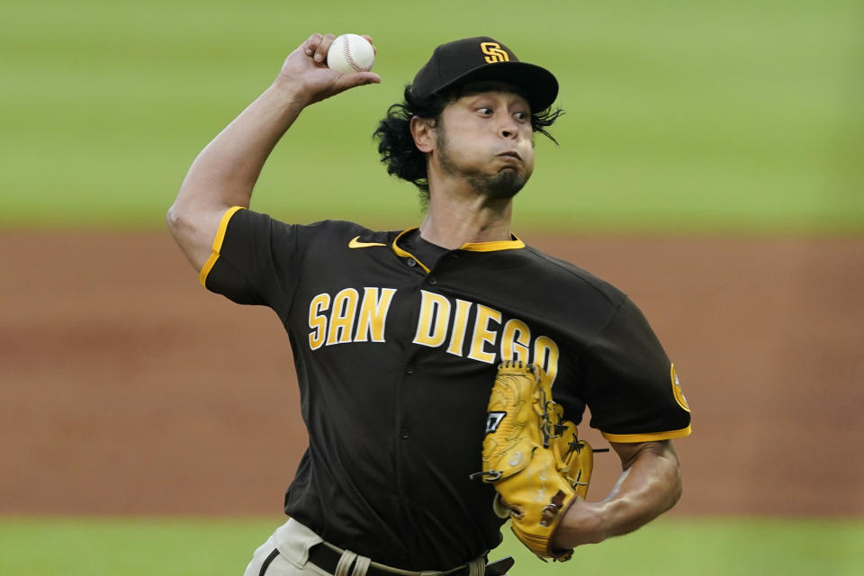 San Diego Padres starting pitcher Yu Darvish works in the first inning of a baseball game against the Atlanta Braves, Friday, May 13, 2022, in Atlanta. (AP Photo/John Bazemore)