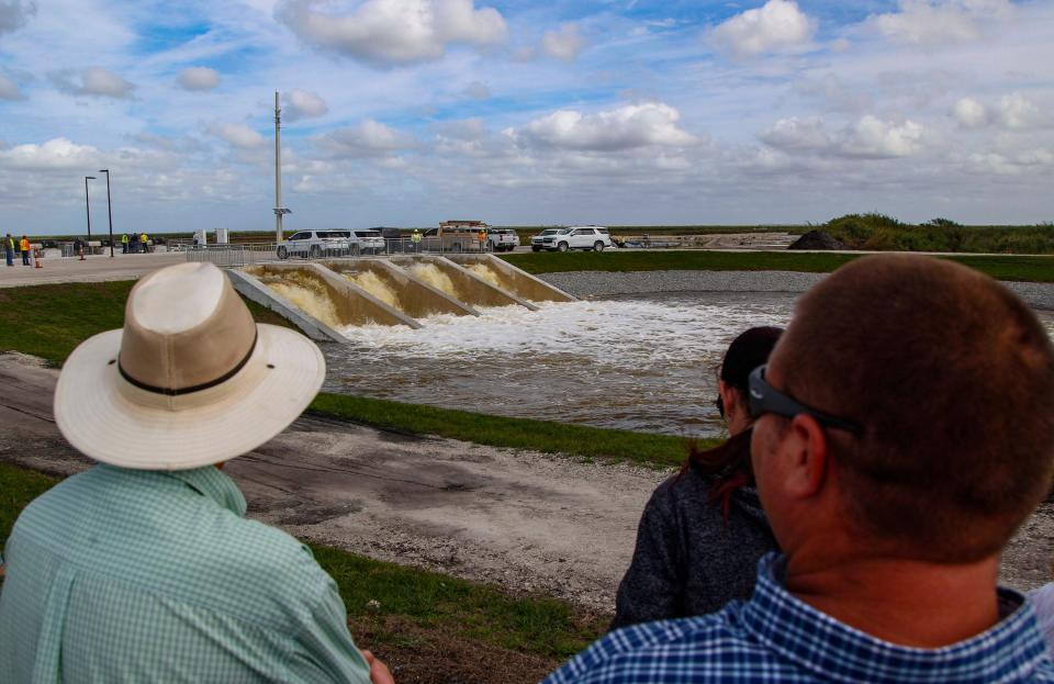 People watch as a new pump station opens at the Central Everglades Planning Project, Jan. 25, 2024, in Palm Beach County. The Everglades Agricultural Area features a 10,500 acre reservoir and a 6,500 acre stormwater treatment area.