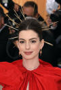 <p> For the 2018 Met Gala red carpet, Anne Hathaway opted for quite classic make-up to go with her statement hair accessory with one twist – a pop of shimmery and glittery eyeshadow in the middle of the lower lash line to really accentuate her eyes. </p>