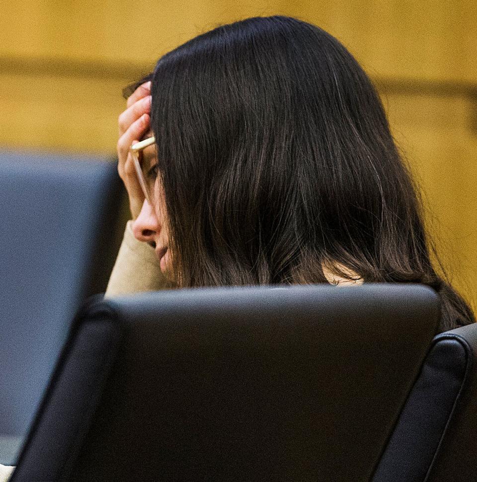 Jodi Arias listening to the prosecutors opening argument.