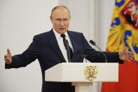 FILE - Russian President Vladimir Putin delivers his speech during an awarding ceremony for the Russian Olympic Committee medalists of the XXIV Olympic Winter Games in Beijing and members of the Russian Paralympic team, at the Kremlin in Moscow, Russia, Tuesday, April 26, 2022. (AP Photo/Alexander Zemlianichenko, File)