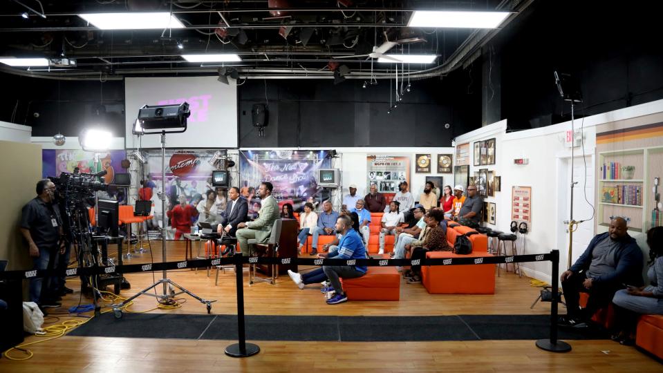 Stephen A. Smith, left, and Bart Scott, a former Detroit Southeastern and NFL player, work during the airing of "First Take" from WGPR in Detroit on Friday, Sept. 9, 2022. The live show had a studio audience made up of Detroit sports fans listening to the two talk about football and other sports related topics.