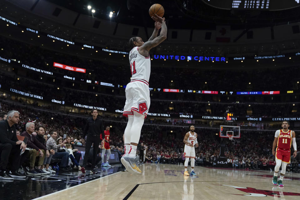 Chicago Bulls forward DeMar DeRozan jumps hits a 3-pointer against the Atlanta Hawks during the second half of an NBA basketball game Tuesday, Dec. 26, 2023, in Chicago. (AP Photo/Erin Hooley)