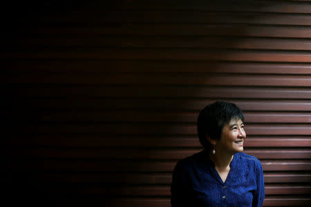 Joan Carling, a prominent indigenous rights activist from the Kankanaey tribe of the northern Philippines' Cordillera region poses for a photo before an interview with the Thomson Reuters Foundation at a hotel in Bangkok, Thailand, October 20, 2016. REUTERS/Athit Perawongmetha