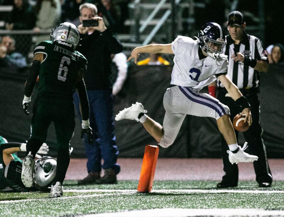 Rumson-Fair Haven senior wide receiver Scott Venancio is shown scoring the game-winning touchdown in the Bulldogs' come-from-behind 34-27 overtime win over Raritan this past Friday night in the NJSIAA South Group 2 championship game.