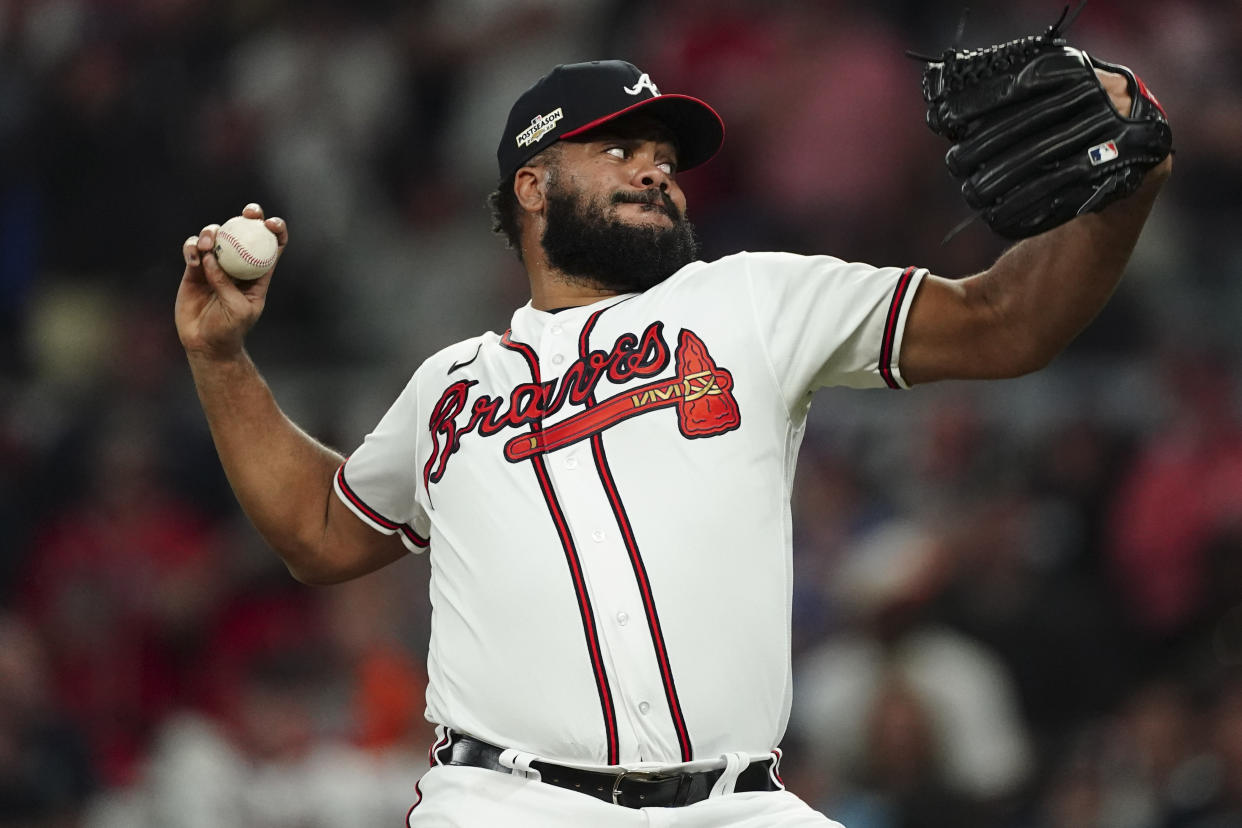 Atlanta Braves relief pitcher Kenley Jansen (74) works during the ninth inning in Game 2 of baseball's National League Division Series between the Atlanta Braves and the Philadelphia Phillies, Wednesday, Oct. 12, 2022, in Atlanta. (AP Photo/John Bazemore)