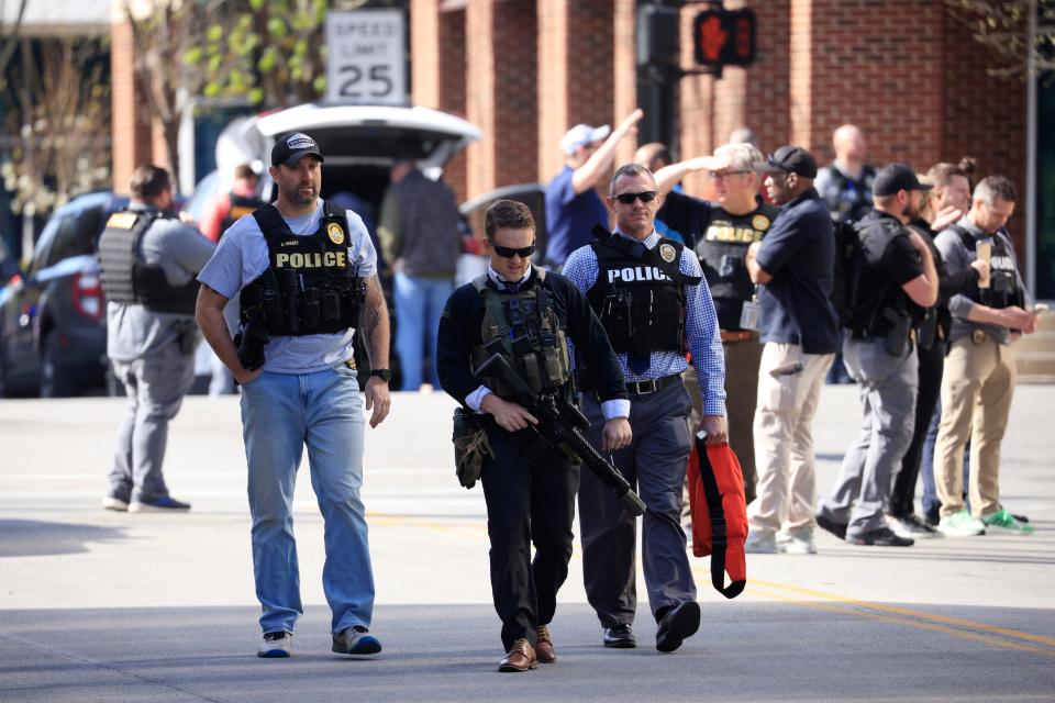 LOUISVILLE, KY - APRIL 10: Law enforcement officers respond to an active shooter at the Old National Bank building on April 10, 2023 in Louisville, Kentucky. According to reports, there are multiple fatalities and injuries. The shooter died at the scene. (Photo by Luke Sharrett/Getty Images)