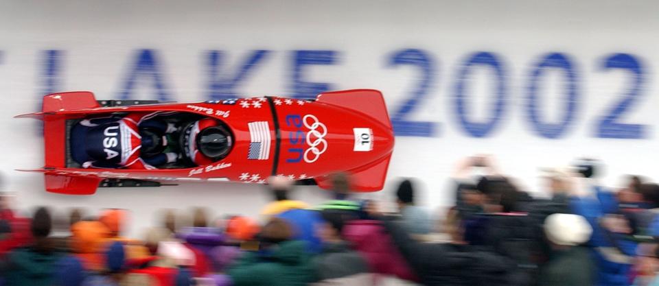 USA’s Jill Bakken, driver, and Vonetta Flowers, brakeman, come down turn 11 in the bobsled track in their first run in the women’s bobsled at the Utah Olympic Park on Tuesday, Feb. 19, 2002. Bakken and Flowers won the gold medal. | Johanna Kirk, Deseret News