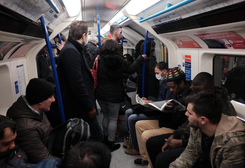 A packed carriage full of passengers travelling on the Victoria line of the London Underground tube network, after Boris Johnson ordered pubs and restaurants across the country to close tonight as the Government announced unprecedented measures to cover the wages of workers who would otherwise lose their jobs due to the coronavirus outbreak.