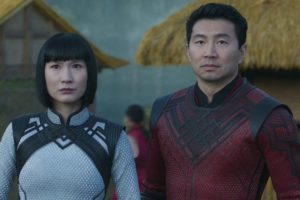 Xialing and Shang-Chi stand side by side