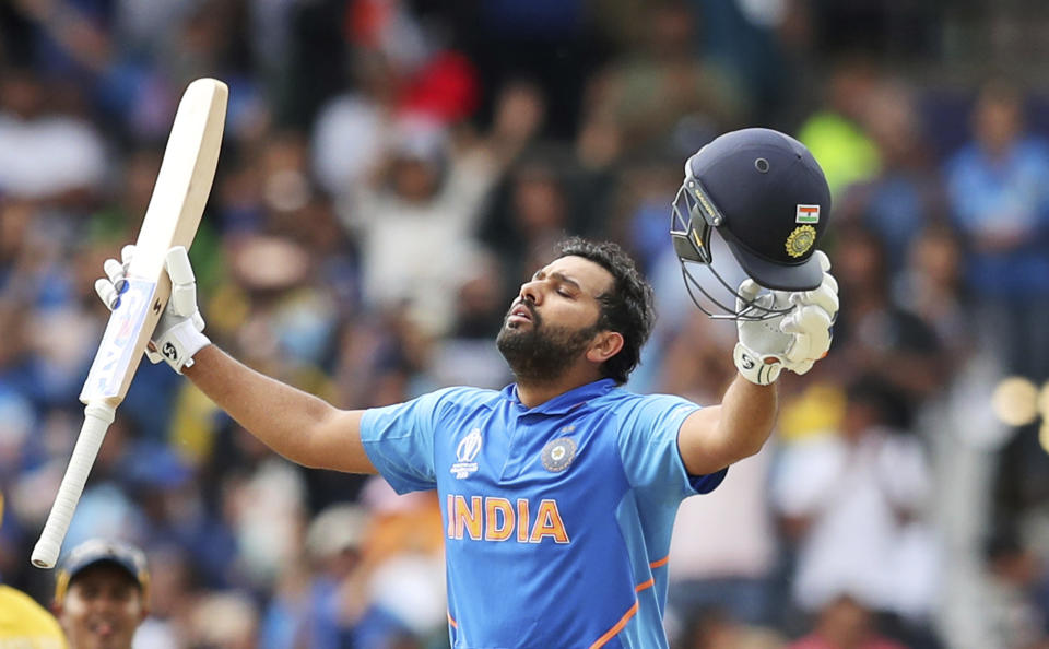 India's Rohit Sharma celebrates after scoring a century during the Cricket World Cup match between India and Sri Lanka at Headingley in Leeds, England, Saturday, July 6, 2019. (AP Photo/Jon Super)