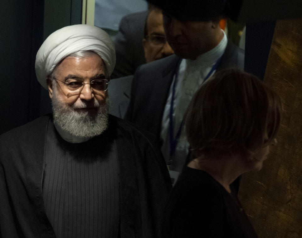 Iran's President Hassan Rouhani walks towards the podium before addressing the 74th session of the United Nations General Assembly, Wednesday, Sept. 25, 2019. (AP Photo/Craig Ruttle)