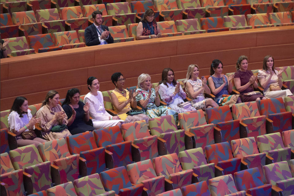 First lady Jill Biden, center, and spouses of heads of state applaud a musical performance by Youth Orchestra Los Angeles at The Walt Disney Concert Hall during a spouses luncheon at the Summit of the Americas, Friday, June 10, 2022, in Los Angeles. (AP Photo/Michael Owen Baker)