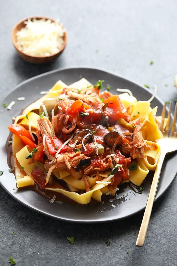 <p>This dinner is perfect for a busy Saturday — dump your ingredients into your slow cooker first thing in the A.M. and return later to a dulcetly smooth pasta sauce. </p><p><a href="https://fitfoodiefinds.com/chicken-cacciatore-slow-cooker-recipe/" rel="nofollow noopener" target="_blank" data-ylk="slk:Get the recipe from Fit Foodie Finds »;elm:context_link;itc:0;sec:content-canvas" class="link "><em><em>Get the recipe from Fit Foodie Finds »</em></em></a></p>