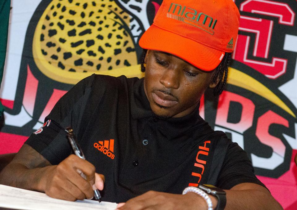 Four-star CB Khamauri Rogers of Holmes Central High School in Lexington, Miss., signs to the University of Miami Wednesday, Dec. 15, 2021 in Jackson, Miss.