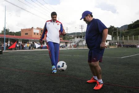 Venezuela's President Nicolas Maduro attends a soccer practice with Argentina soccer legend Diego Maradona in Caracas, Venezuela November 7, 2017. Miraflores Palace/Handout via REUTERS