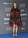 <p>This caped Alexander McQueen dress has to be one of Natalie’s best looks of all time. Boasting a tiered design and a striking floral print, it completely took the attention away from the star’s bump and was a fantastic style statement. [Photo: Getty] </p>