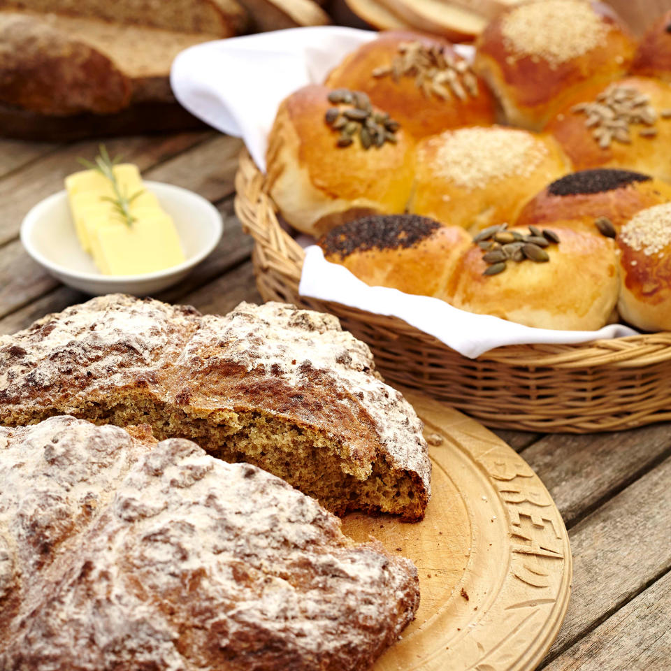 Loves of bread on wooden table