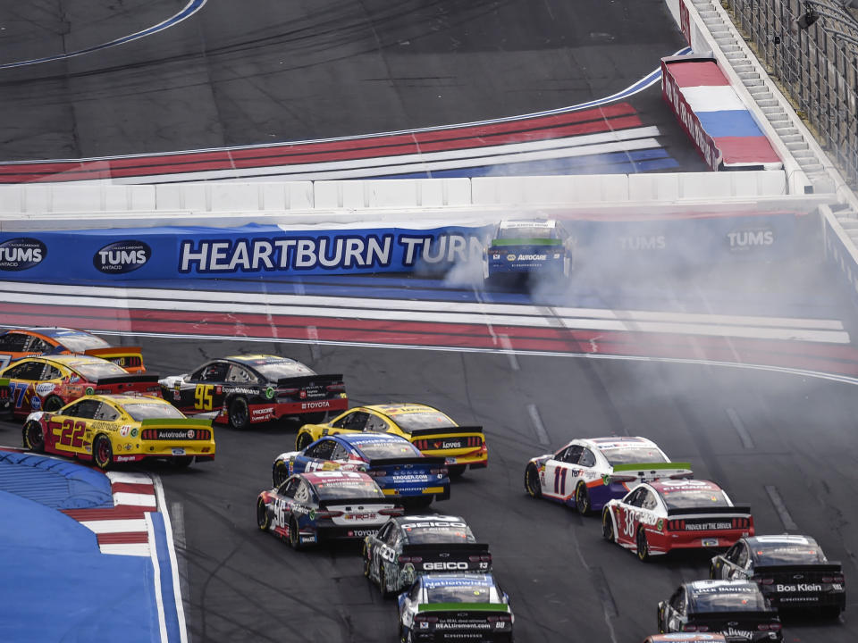 Chase Elliott (9) hits the wall in Turn 1 on a restart during a NASCAR Cup Series auto race at Charlotte Motor Speedway, Sunday, Sept. 29, 2019, in Concord, N.C. (AP Photo/Mike McCarn)