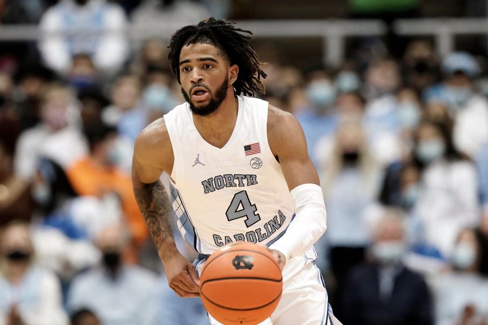 North Carolina guard RJ Davis (4) dribbles during the first half of an exhibition NCAA college basketball game against Elizabeth City State in Chapel Hill, N.C., Friday, Nov. 5, 2021. (AP Photo/Gerry Broome)