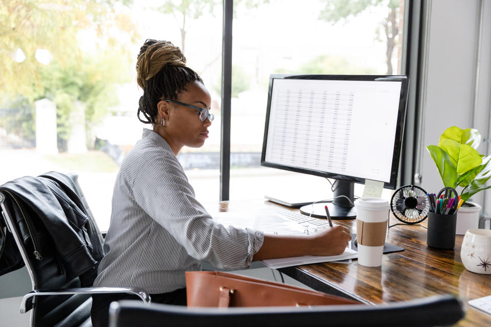 Slow computer? Consider deleting old computer files. (Photo: Getty)