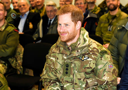 Britain's Prince Harry, Duke of Sussex talks to British and Norwegian military personnel in Bardufoss, Norway February 14, 2019. NTB Scanpix/ Rune Stoltz Bertinussen via REUTERS