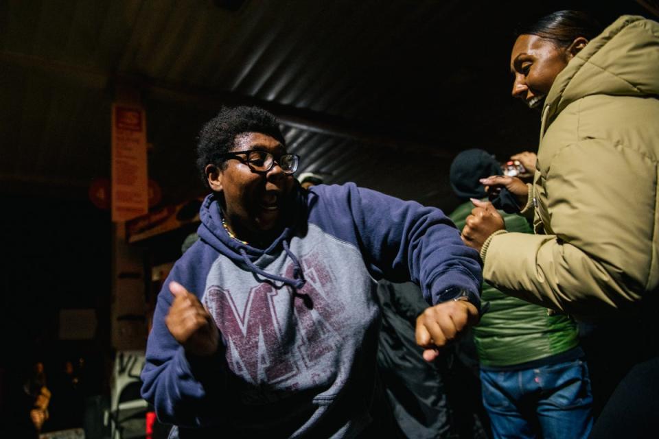 People gather at the intersection of 38th Street and Chicago Avenue following the guilty verdict in the trial of Derek Chauvin on April 20, 2021 in Minneapolis, Minnesota (Getty Images)