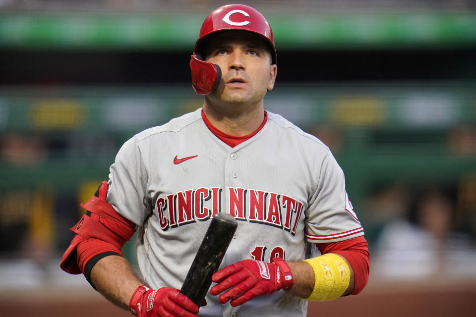 Cincinnati Reds' Joey Votto walks back to the dugout after striking out against Pittsburgh Pirates starting pitcher Dillon Peters during the second inning of a baseball game in Pittsburgh, Tuesday, Sept. 14, 2021. (AP Photo/Gene J. Puskar)