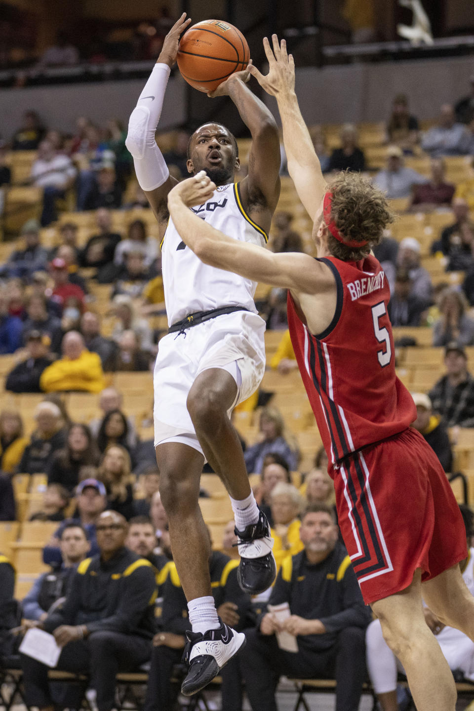 Missouri's Amari Davis, left, shoots over Utah's Jaxon Brenchley, right, during the second half of an NCAA college basketball game Saturday, Dec. 18, 2021, in Columbia, Mo. (AP Photo/L.G. Patterson)