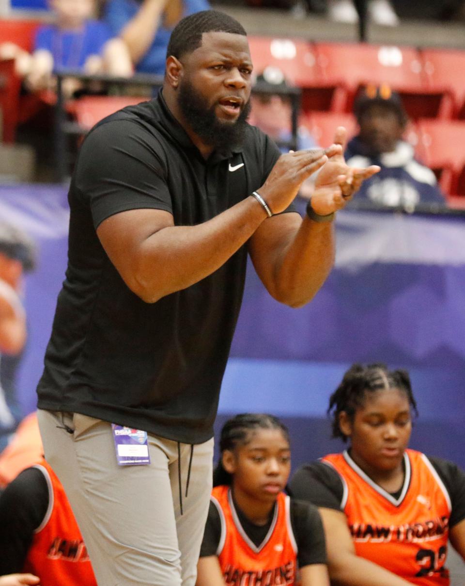 Coach Cornelius Ingram tries to rally his team who trailing going in the final minutes of the game. Class 1A Girls semi-Final game between the Hawthorne Hornets and the Wildwood Wildcats. Fshaa 2024 State Championships Lakeland, Fl. February 29th 2024. Special to the Gainesville Sun/ Calvin Knight.