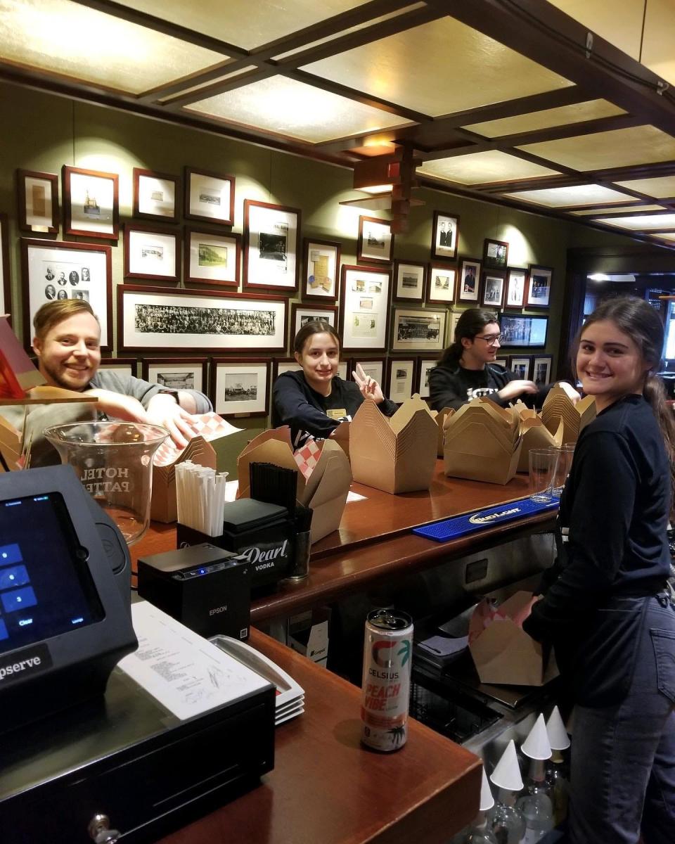 Boxes are assembled as part of a taco salad fundraiser on Tuesday, March 14 at the Hotel Pattee.