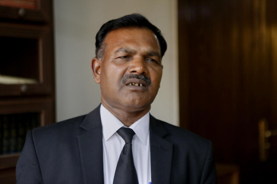 Naseeb Anjum, a lawyer for Nabeel Masih, a Christian man convicted while still a teenager in 2018 of blasphemy, speaks to The Associated Press, in Lahore, Pakistan, Monday, March 1, 2021. Anjum said a Pakistani court granted bail to Masih convicted of insulting Islam by posting a picture of Islam’s holiest site on social media. (AP Photo/K.M. Chaudary)