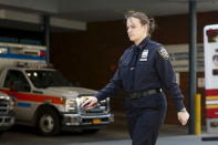 A NYPD officer arrives at the Jamaica Hospital, where New York City plainclothes police officer Brian Moore who was shot in the head is being treated, in New York May 3, 2015. REUTERS/Eduardo Munoz