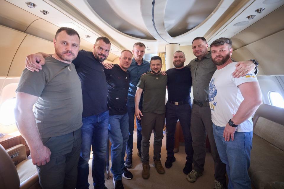 President Volodymyr Zelensky and the commanding officers who defended the Azovstal plant in Mariupol stand in a plane on July 8, 2023, before returning to Ukraine (Zelensky's Facebook page).