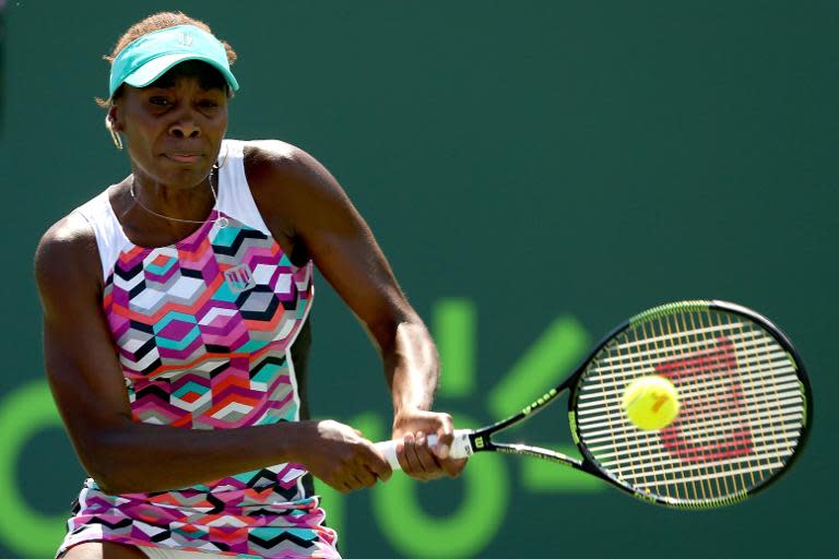 Venus Williams competes against Caroline Wozniacki on day 8 of the Miami Open tournament on March 30, 2015 in Key Biscayne